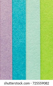 Colorful textured paper for background.Multi-colored stacked paper designs, paper art  illustration design. 