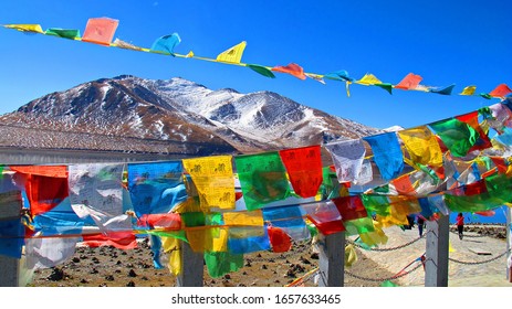 Colorful Tibetan prayer flag. each flag have Tibetan language prayer  chant