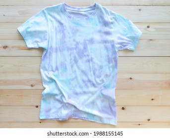 Colorful Tie Die Tshirt On Wooden Background. Asian Fashion Summer