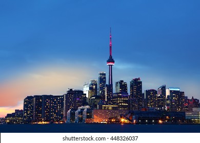 The Colorful Toronto, Canada Skyline At Dusk