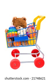 Colorful Toys In The Shopping Cart. Isolated Over White