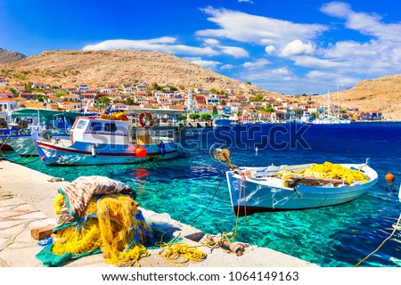 Colorful traditional Greece - beautiful island Chalki with fishing boats