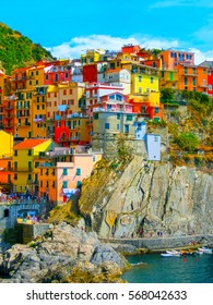 Colorful traditional houses on a rock over Mediterranean sea t, Manarola, Cinque Terre, Italy