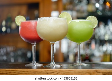 Colorful Traditional Mexican food and drink dishes margaritas and daiquiris