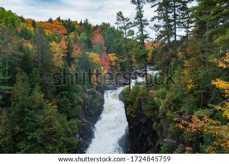 Colorful Trees waterfall Autumn in Parc des Chutes Dorwin, Rawdon 