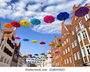 Colorful umbrellas adorn the streets of Lübeck - Shutterstock ID 2168319631