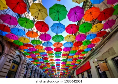 Colorful umbrellas hanging out above the old streets of Timisoara city center, Romania. Photo taken on 21st of April 2019. - Powered by Shutterstock