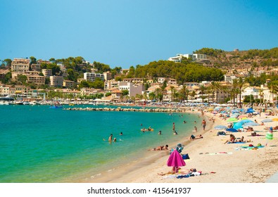 Colorful Umbrellas On Puerto De Soller, Port Of Mallorca Island In Balearic Islands, Spain. Beautiful Picture Of People Resting On The Beach On Bright Summer Day.