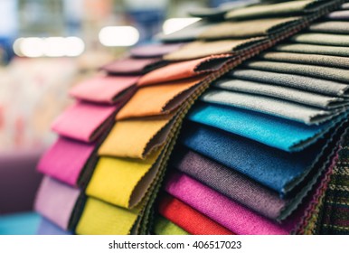 Colorful upholstery fabric samples - Shutterstock ID 406517023