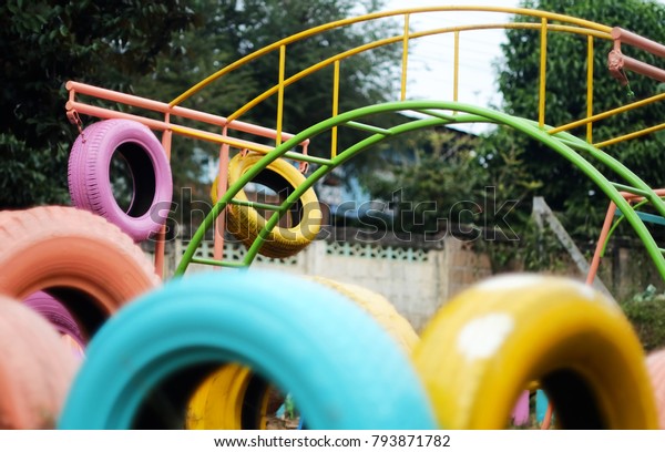 colorful used tires
playground in poor
school