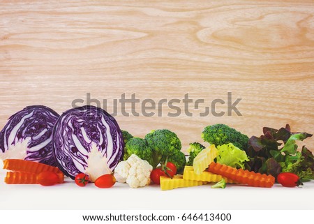 colorful vegetables and wood background
