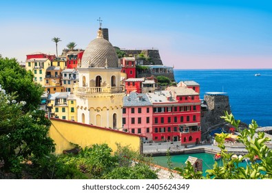 Colorful Vernazza village with church tower, Cinque Terre, Italy.