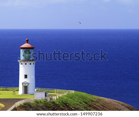 Colorful view of the Kilauea Point Lighthouse and the deep blue ocean off the north shore of Kauai, Hawaii.