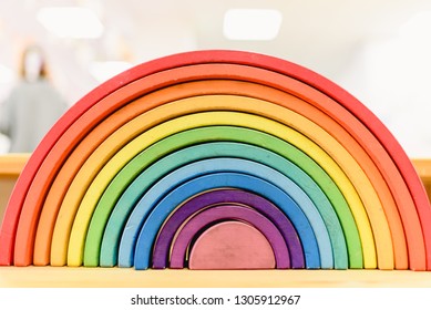 Colorful Waldorf Wooden Rainbow In A Montessori Teaching Pedagogy Classroom.