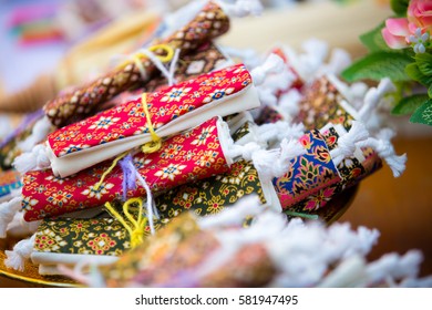 Colorful of wallet wedding souvenir, made from thai fabric pattern