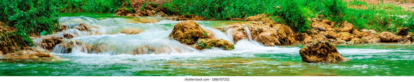 Colorful waterfall landscape. Gurleyik stream with long exposure, Mihaliccik, Eskisehir, Turkey. Panoramic shot. High resolution sharp photo. Panorama banner. - Shutterstock ID 1886707252