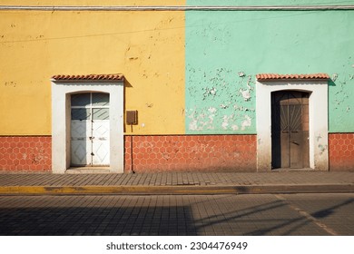 Colorful weathered facades on Morelos Avenue downtown Cholula magical town, Puebla, Mexico. Typical Mexican village. - Shutterstock ID 2304476949