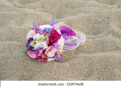 Colorful Wedding Flowers On The Beach.