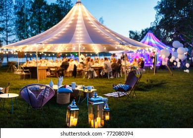 Colorful wedding tents at night. Wedding day.