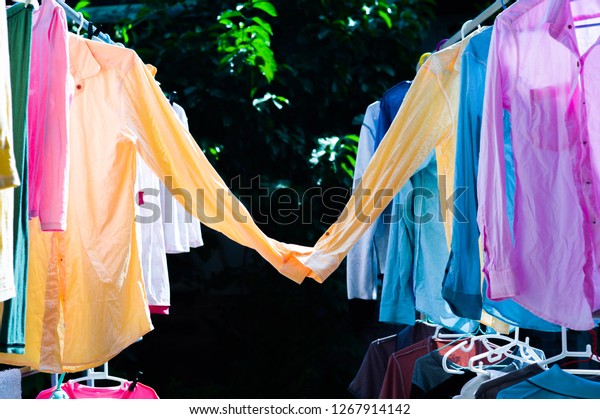 Colorful Wet Clothes Hanging On Steel Stock Photo 1267914142 | Shutterstock