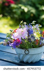 Colorful Wild Flowers In A Old Cake Tin