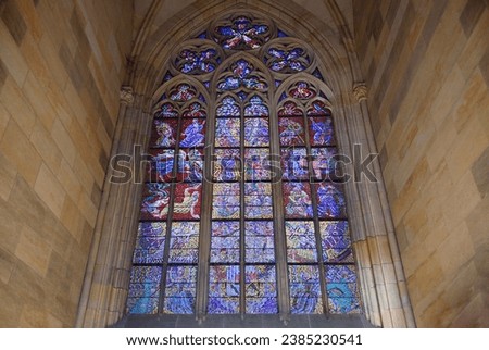 Colorful window of St. Vitus Cathedral in Prague