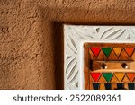 Colorful window of Ushaiger heritage village in Saudi Arabia of a house in Ad Diriyah, made out of mud, Najran, Kingdom of Saudi Arabia, Middle East