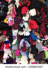 Colorful Winter Gloves On Street Counter