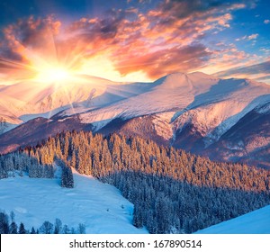 Colorful Winter Sunrise In Mountains.