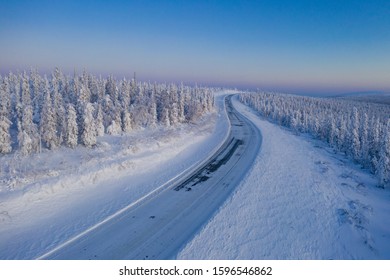Colorful Winter View Of The Famous Dalton Highway Ice Road In Alaska