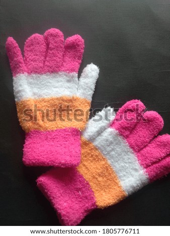 colorful women gloves,isolated on black background