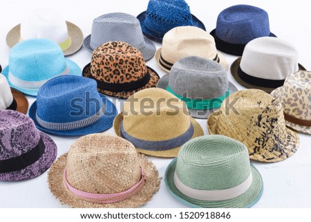 colorful women Pretty
 hats collection,hats for sale at a market

