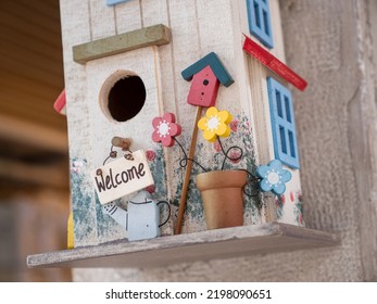 A Colorful Wooden Birdhouse With Inscription Welcome, Venice Italy