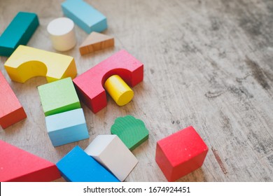 Colorful wooden brick for kids close up