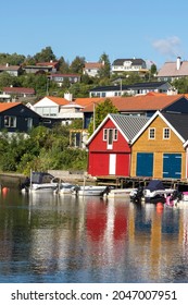 colorful wooden houses on the sea in Osoyro in Norway