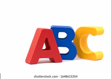Colorful wooden letters against white background, ABC - Shutterstock ID 1648615354