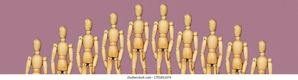 A colorful wooden mannequin raises his hand against the background of other mannequins. The character reports to the project, other people do not want to take part in the project. Lifestyle. - Powered by Shutterstock