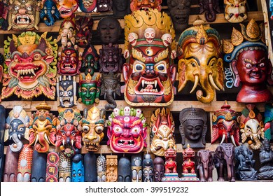 Colorful wooden masks and handicrafts on sale at shop in the Thamel District of Kathmandu, Nepal.