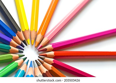 Colorful wooden pencils isolated on white background