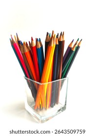 Colorful wooden pencils neatly arranged in a transparent container on a white background. Bright hues and clean composition make this image ideal for creative, educational, or office-related themes.
