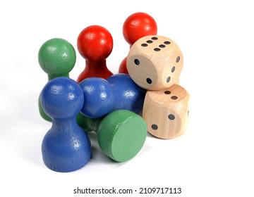 Colorful Wooden Skittles And Dice Against White Background