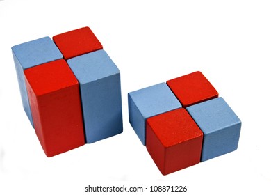 Colorful wooden toy blocks isolated on white background