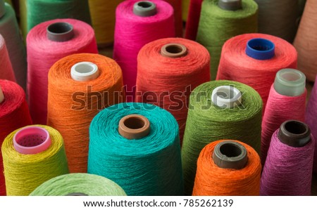 Colorful yarn on spool, yarn on tube, cotton, wool, linen thread
