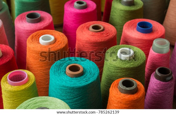Colorful yarn on spool, yarn on tube, cotton,
wool, linen thread
