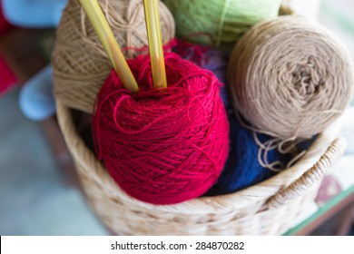 Colorful Yarn In Wicker Basket