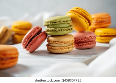 Colorful yellow, pink Macrons closeup. Sweet dessert, sugar