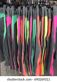 Colorful Yoga Pants Hanging On A Rack