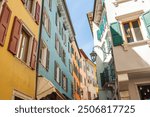 Colorfull buildings in a street of the Riva del Garda, town on the shores of Lake Garda, Italy, Europe.