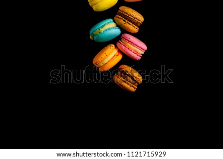 Similar – macarons lies in a row in the middle