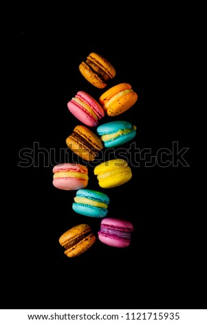 Similar – macarons lies in a row in the middle